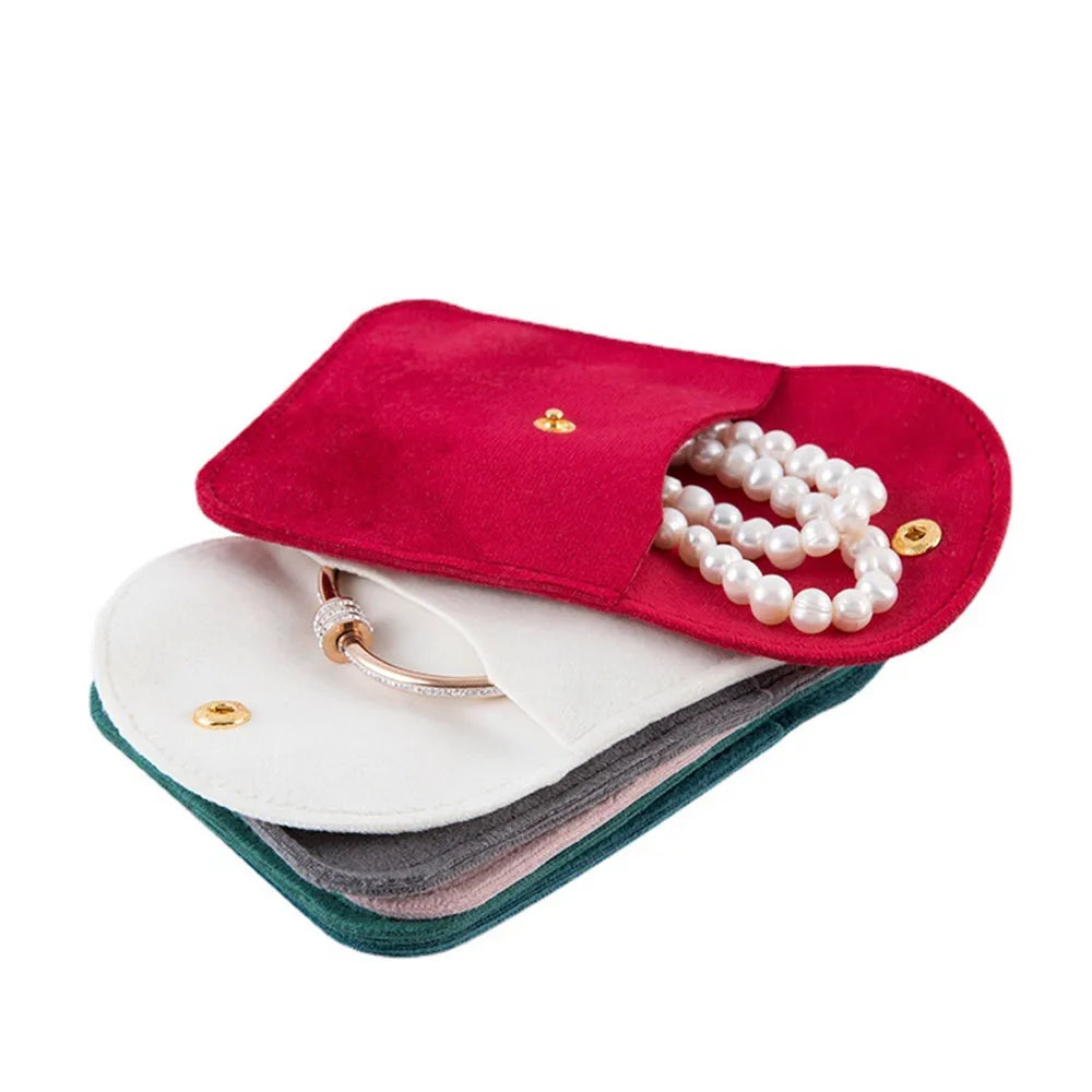 Pochette velours bijoux bouton pression