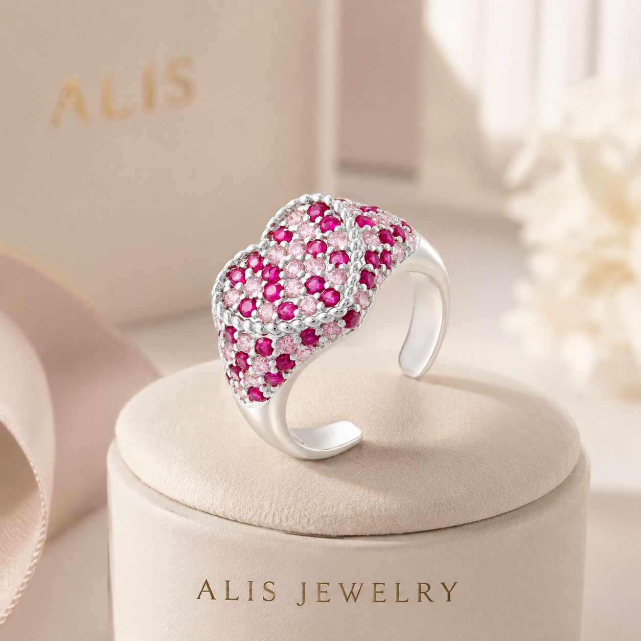 Bague cœur pierre rose sur support minéral