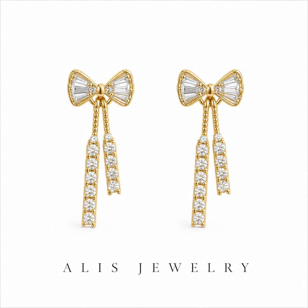 boucles d'oreilles nœud doré strass - Alis Jewelry - fond blanc