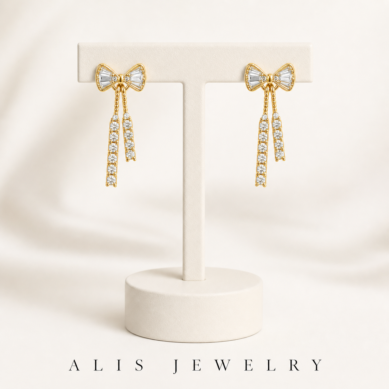 boucles d'oreilles nœud doré strass - Alis Jewelry - sur support minéral