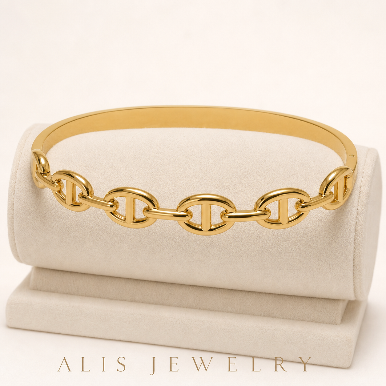 bracelet jonc bouton acier doré - Alis Jewelry - sur support minéral