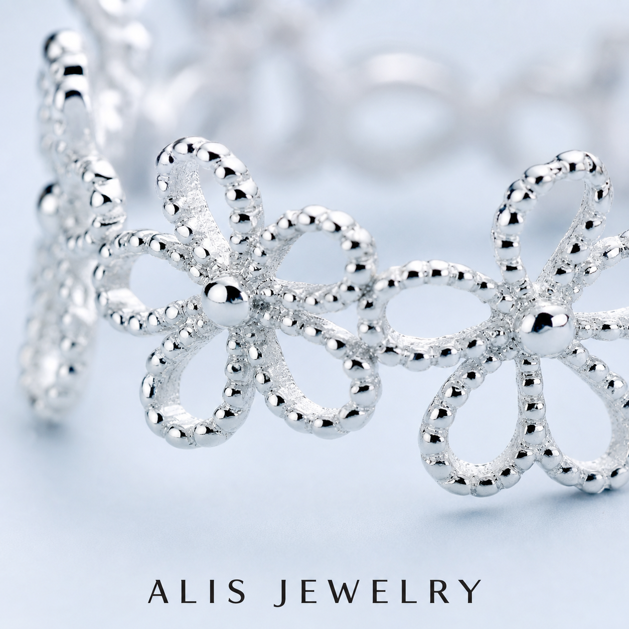 Bague fleur ajourée argent - Alis Jewelry - gros plan / zoom