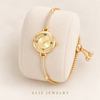 Montre-bracelet dorée petit cadran et strass - Alis Jewelry - sur support minéral